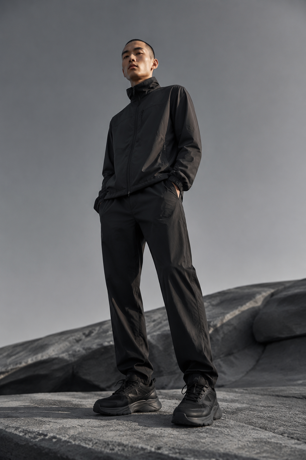 Carbon Volume Runner worn by a FINALDARK fashion model