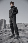 Graphite Sculpted Runner worn by a FINALDARK fashion model