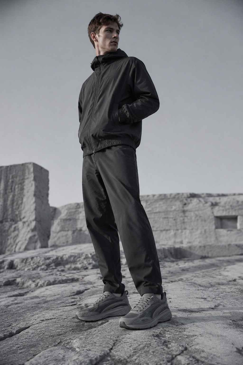 Graphite Sculpted Runner worn by a FINALDARK fashion model